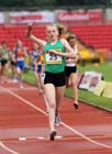 Elizabeth Hood (Dorset) wins the 1500 Junior Girls.